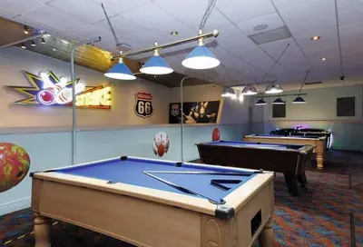 a room with several pool tables in a room at HARRIES LODGE QUAY WEST milkwood way in New Quay
