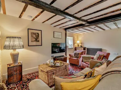 a living room with a couch and a tv at 3 Bed in Brecon oc-94434 in Velindre