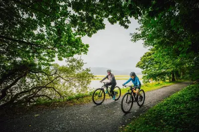 two people riding bikes down a dirt road at 1 Bed in Llanfyllin oc-p29023 in Llanfyllin