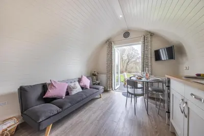 a living room with a couch and a table at 1 Bed in Llanfyllin oc-p29023 in Llanfyllin