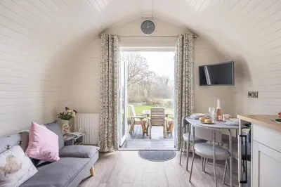 a living room with a couch and a table at 1 Bed in Llanfyllin oc-p29023 in Llanfyllin