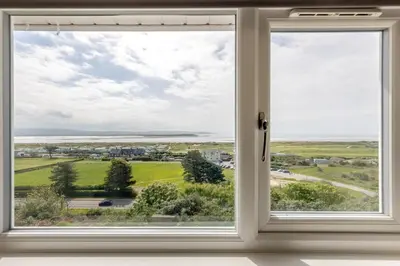 a window with a view of the ocean at 3 Bed in Aberdovey oc-v29263 in Aberdyfi