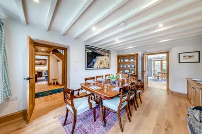a dining room with a table and chairs at 4 Bed in Derwenlas oc-c29244 in Machynlleth