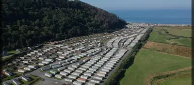 an aerial view of a large parking lot with cars at Discover Serenity in Our 3-Bed Static Caravan at Clarach Bay Holiday Village! in Aberystwyth