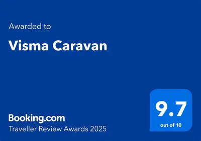 a blue screen with the text wanted to vinna caravagan at Visma Caravan in Llanddwywe