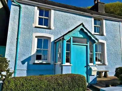 a blue house with a blue door at The Rope and Anchor Aberaeron in Aberaeron