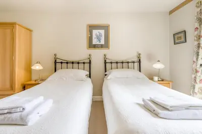 two beds sitting next to each other in a bedroom at 2 Bed in Little Hereford oc-l29580 in Berrington