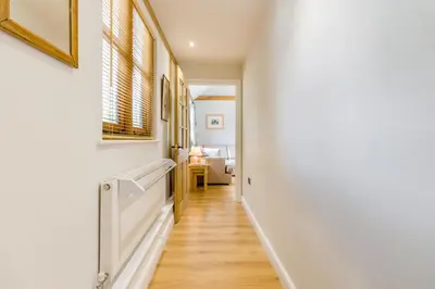 a hallway with white walls and wooden floors at 2 Bed in Little Hereford oc-l29580 in Berrington