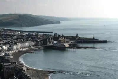 an aerial view of a city next to the ocean at Abergwaun APT 1 in Aberystwyth