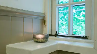 a bowl sitting on a window sill in a room at Hafod Cae Maen in Penrhyndeudreath