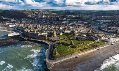 an aerial view of a city next to the ocean at Fisherman's Cottage in Aberystwyth