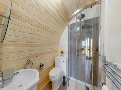 a bathroom with a toilet and a shower at Leri - Uk46065 in Llancynfelyn