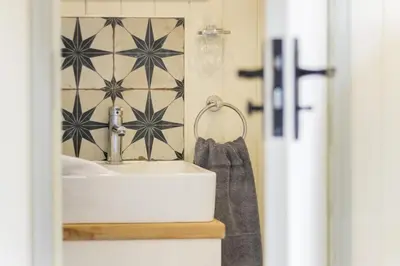 a bathroom with a sink and a towel at 1 Bed in Leintwardine oc-b29785 in Brampton Bryan