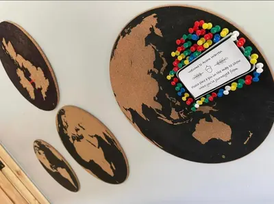 a picture of a globe with a cell phone on it at Acorn Warren in Welshpool
