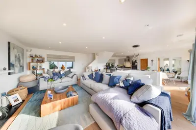 a living room with couches and a table at 5 Bed in Aberdovey oc-t29402 in Aberdyfi