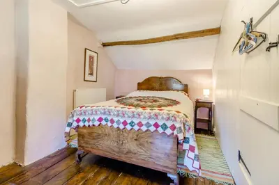 a bedroom with a large bed in a room at 3 Bed in Llwynygroes oc-t29715 in Llangeitho