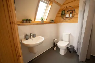 a bathroom with a sink and a toilet at Aberystwyth by Wigwam Holidays in Aberystwyth