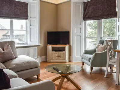 a living room with a couch and a tv at Uk47786 - Flat 4E in Aberystwyth