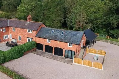 an aerial view of a large brick house at The Annexe in Chirbury