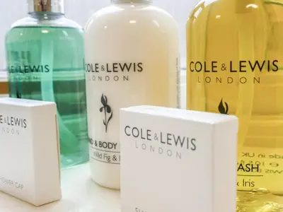 a group of bottles of liquid on a table at The Corn House - Cottage in Great Hanwood