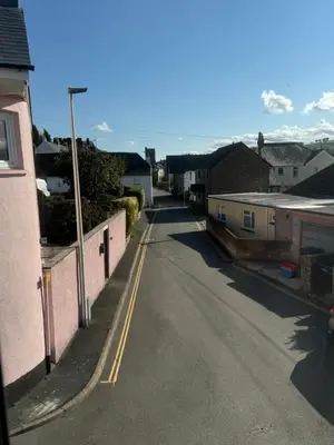 an empty street in a town with houses at 3 bedroom cottage Brecon sleeps 4 in Brecon
