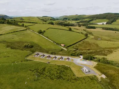 an aerial view of an estate in a field at Hafren by Wigwam Holidays in Llanbrynmair