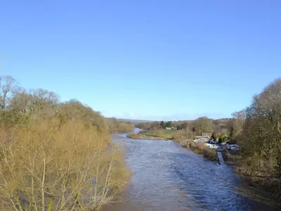 a view of a river from a bridge at Court House in Hay-on-Wye