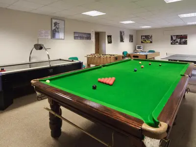 a pool table in a room with afits at Shippon Cottage - E4299A in Halston