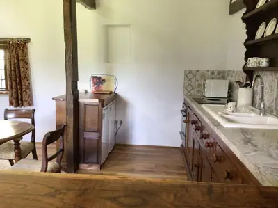 a kitchen with a sink and a counter top at Ashford Bridge Barn in Ludlow