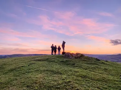 a group of people standing on top of a hill at Ash Lodge - Hw7442 in Nantmel