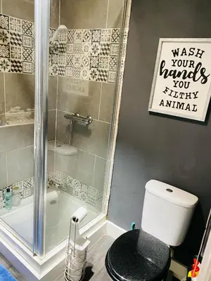 a bathroom with a shower and a toilet and a sink at Sy3 Shrewsbury in Shrewsbury