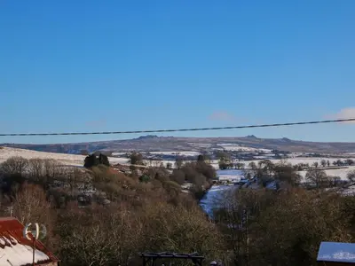 a view of a snow covered valley with a river at Stiper View Barn 2 in Shrewsbury