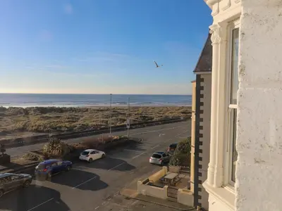 arial view of a parking lot with a view of the ocean at Sandcastles in Barmouth