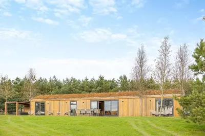 a wooden house with a large yard at 4 Bed in Llansanffraid oc-k30383 in Llanymynech