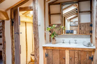a bathroom with a sink and a mirror at 14 Bed in Llansanffraid oc-b30382 in Llanymynech