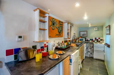 a kitchen with a counter with food on it at 1 Bed in Llandderfel oc-t30475 in Llandderfel