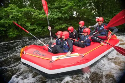 a group of people in a raft on a river at 2 Bed in Llanuwchllyn oc-t30615 in Llanuwchllyn