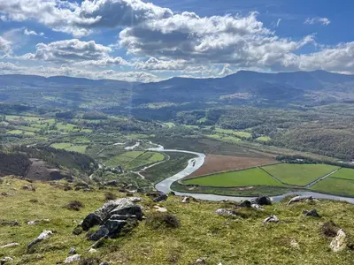 a view from the top of a hill with a river at Clywedog Cottage in Dolgellau