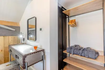 a bathroom with a sink and a mirror at 1 Bed in Berriew oc-a31113 in Berriew