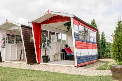 a shed with red white and blue paint on it at Sweeney Hall Hotel in Oswestry