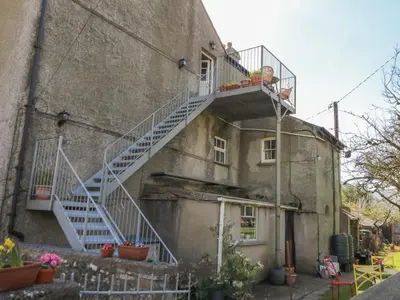 a staircase on the side of a building at Cantref House Top Floor in Brecon