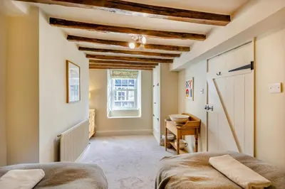 a bedroom with a bed and a window at 3 Bed in Dolgellau oc-h31822 in Dolgellau