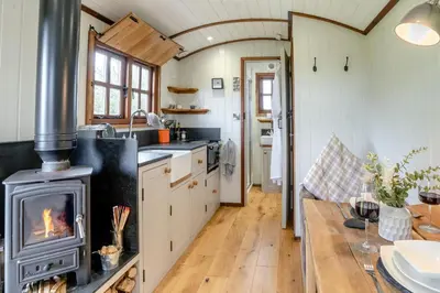 a kitchen with a woodburning stove in a room at 1 Bed in Bronllys oc-t31949 in Bronllys