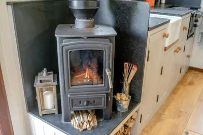a stove sitting on a counter in a kitchen at 1 Bed in Bronllys oc-t31949 in Bronllys
