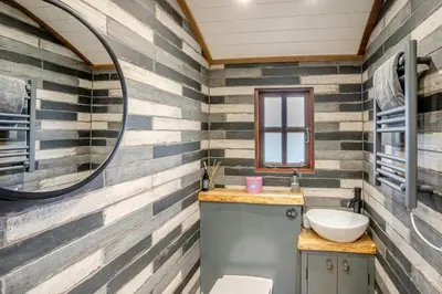 a bathroom with a sink and a mirror at 1 Bed in Bronllys oc-t31950 in Bronllys