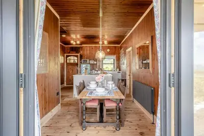a dining room with a table and chairs at 3 Bed in Barmouth oc-c31942 in Barmouth
