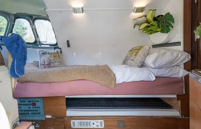 a bed in the back of a camper van at Alaya Airways in Dolgellau