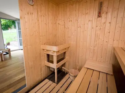a room with a sauna with a wooden wall at 1 Bed in Hereford oc-42897 in Craswall