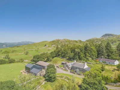 an aerial view of a house on a hill at 4 Bed in Arthog oc-b31966 in Arthog
