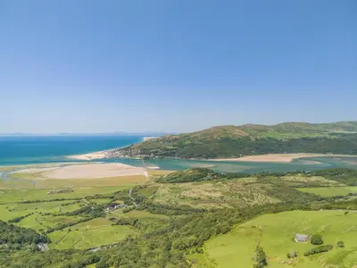 an aerial view of the ocean and a beach at 4 Bed in Arthog oc-b31966 in Arthog